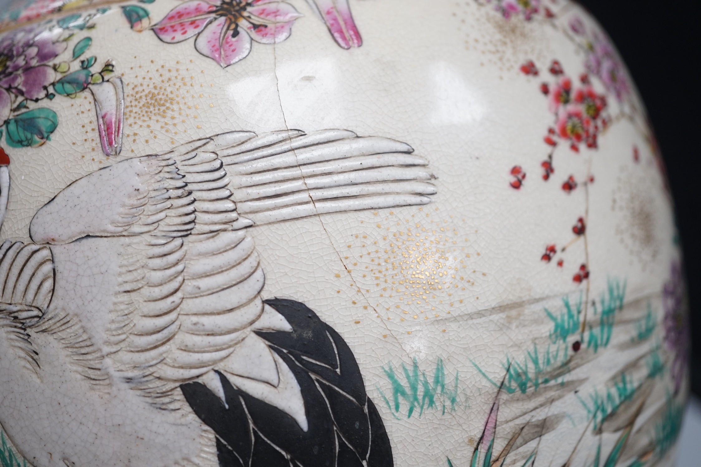 A pair of Japanese Satsuma pottery vases, Meiji period signed above foot, height 38cm